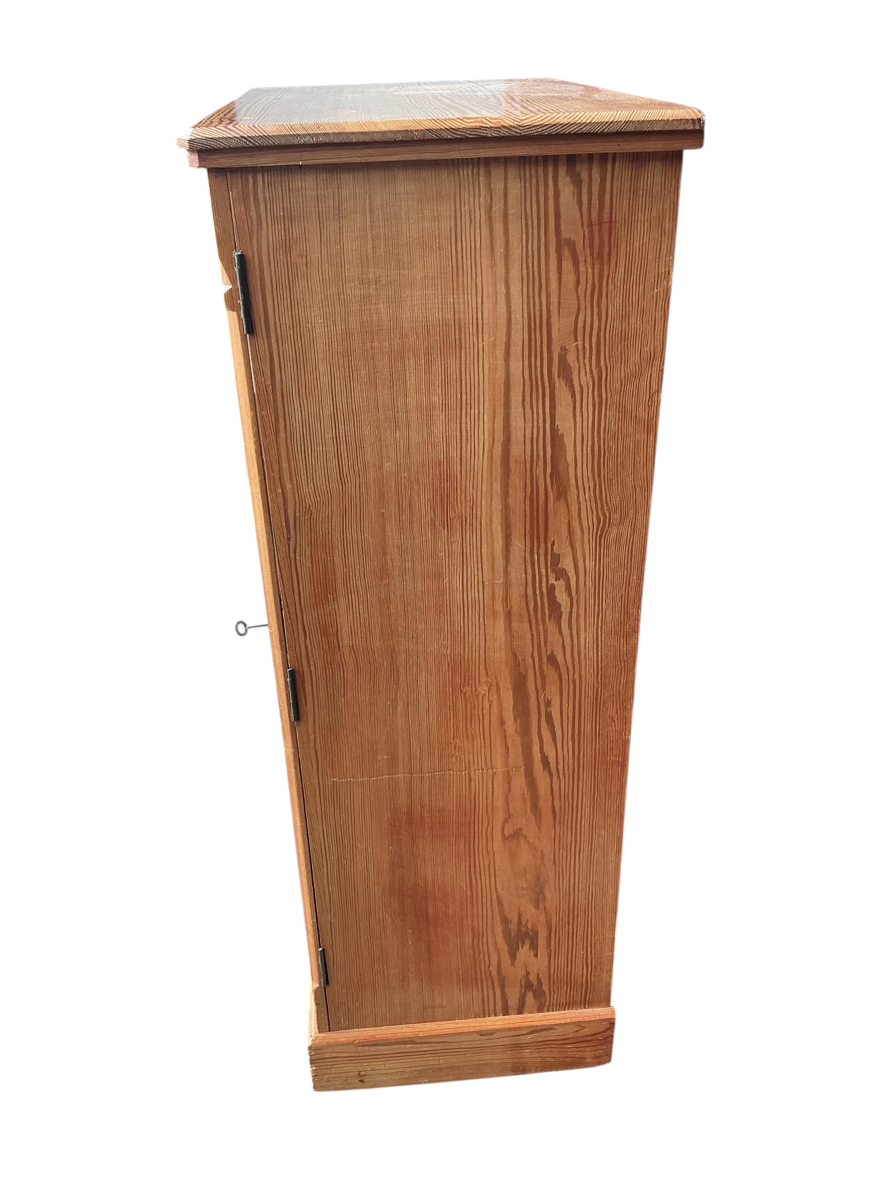 A late Victorian pitch pine wellington chest, width 65cm, depth 40cm, height 116cm